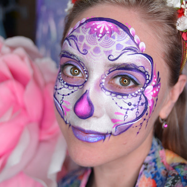 Purple Calavera Face Paint Design by Natalia Kirillova - Facepaint.com