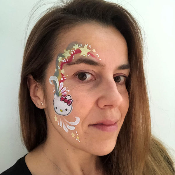 Hello Kitty Face Paint Design by Belén - Facepaint.com